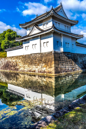 Colorful Outer Wall White Tower Moat Reflection City Street Nijo Castle Kyoto Japan. Completed in 1626 by Tokugawa Shoguns. In 1867 Castle returned to Emperor.の写真素材
