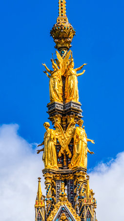 Golden Angels Colorful Prince Albert Memorial Kensington London England. Opened in 1872 After Prince Albert died at 42 years of age Queen Victoria's Husband.  Across from Royal Concert Hall.の写真素材