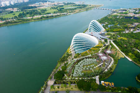 Singapore - November 11, 2017 : Skyline view of the Singapore Gardens by the bay, Flower dome and Cloud Forest facing the Oceanのeditorial素材