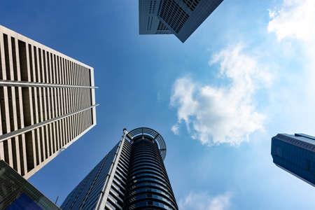 SINGAPORE - MAR 30: View of skyscrapers in Marina Bay on March 30, 2020 in Singapore. Singapore is the world's fourth leading financial centre.  UOB Building and One Raffles placeのeditorial素材