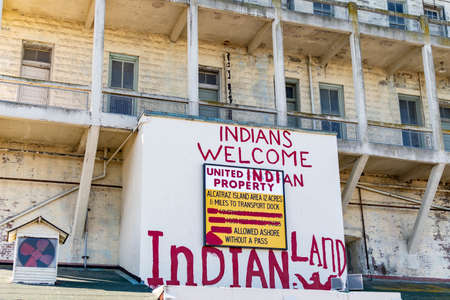 Alcatraz island's  barracks or appartments and bookstore area with the Indian Land Sinage from the center part of the islandのeditorial素材