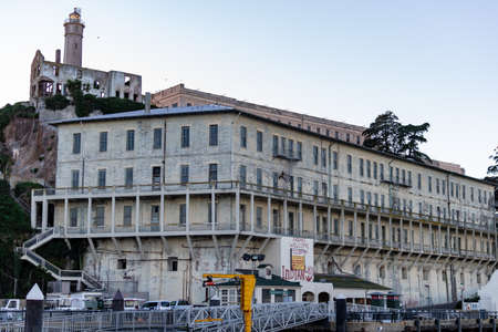 Lighthouse, barracks apartment and shipdock  at Alcatraz Island Prison, San Francisco California USA, March 30, 2020のeditorial素材