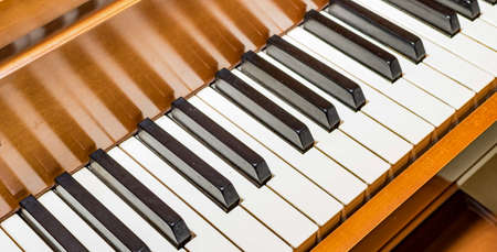 Closeup piano keys. Closeup shot of a vintage piano keys