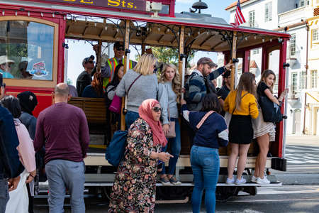 powell and Hyde Cable Car train with some tourists near Beach street, San Francisco, California, USA, March 30, 2020のeditorial素材