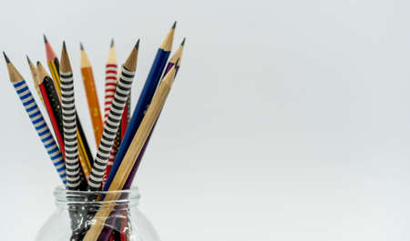 Pencils in a pencil bucket on white background. Back to school conceptの写真素材