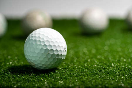 Golf ball on grass. golf sports conceptの写真素材