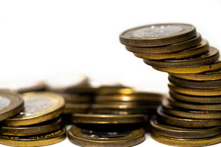 Stack of coins going up. Savings and investment concept