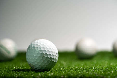 Golf ball on grass. golf sports conceptの写真素材