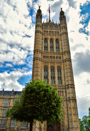 English and United Kingdom Parliament Tower Building and Cloudy Blue Sky in London, Englandの写真素材