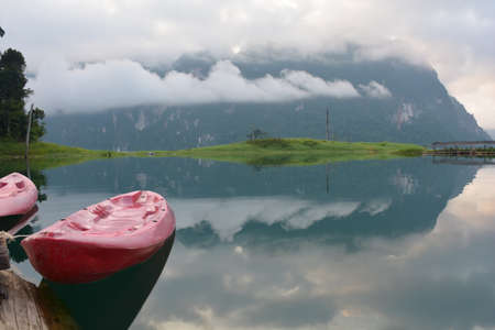 A foggy morning in the lake in Thailandの写真素材