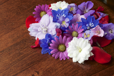 Various flowers on the tableの写真素材