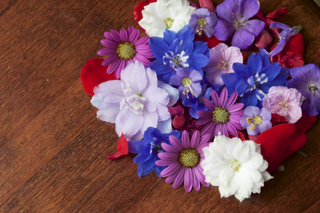 Various flowers on the tableの写真素材
