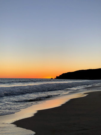 Sunset on the beach of Oaxaca, Mexicoの写真素材