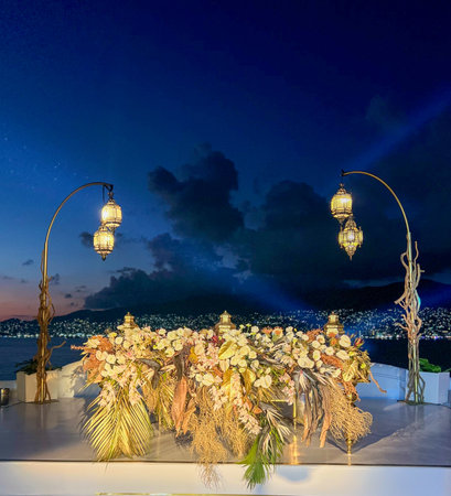 Wedding ceremony on the beach at night.の写真素材