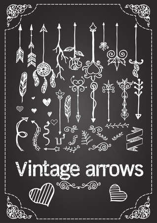 Hand drawn vintage arrows on chalkboard.のイラスト素材