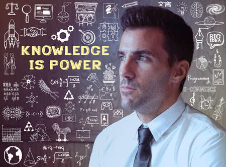 Successful businessman believe that Knowledge is power. Successful thinking. Self developement.Stock...