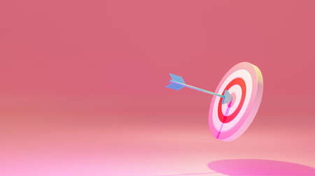 3d render of an arrow hitting the center of a target on a pink background