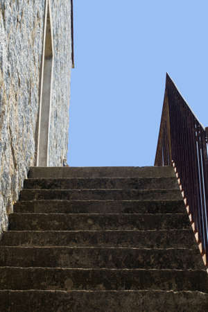 Stairs leading up to beautifully blue sky 