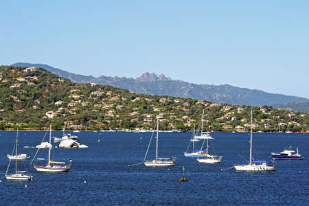 Sailing ships in a blue bay, Corsica
