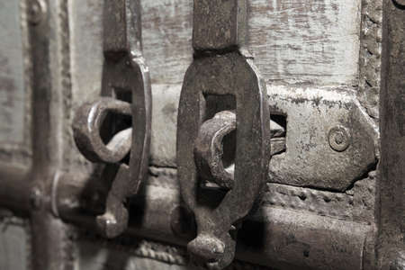 antique hand made vintage wooden hutch - shallow depth of field and focus on metal handle and lockの写真素材