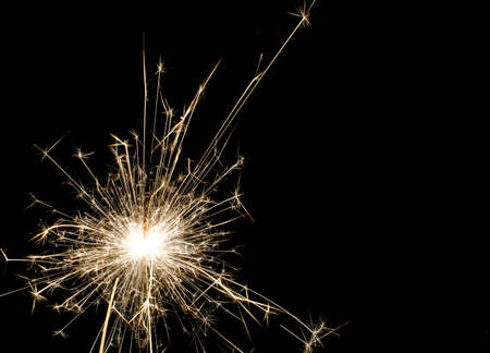 Bengal light, many sparks, explode, black backgroundの写真素材