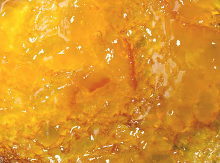 Closeup view of orange confiture backgroundの写真素材