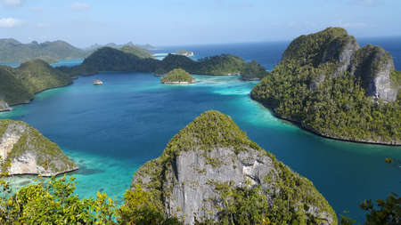 Beautiful lagoon surrounded by green rock islandの写真素材
