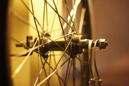 Unused bike cycle wheel with yellow backlightの写真素材
