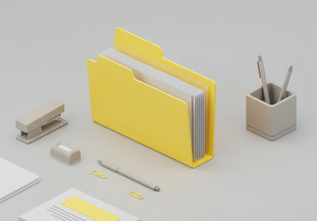 A neatly arranged desk featuring a yellow folder filled with documents, complemented by a stapler, pen, paper clips, and a pen holder. The composition suggests organization and efficiency in a workspace.の素材