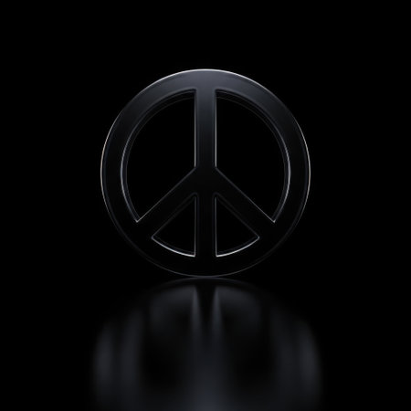 A highly polished, dark black peace symbol is centered against a black background, casting a reflection on a glossy surface below.の素材