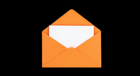 A bright orange envelope is open, revealing a crisp white sheet of paper. The image is set against a stark black background.の素材