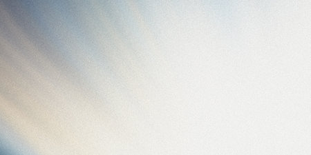 A soft, abstract background featuring a gentle gradient of muted colors and a subtle, grainy texture.の素材
