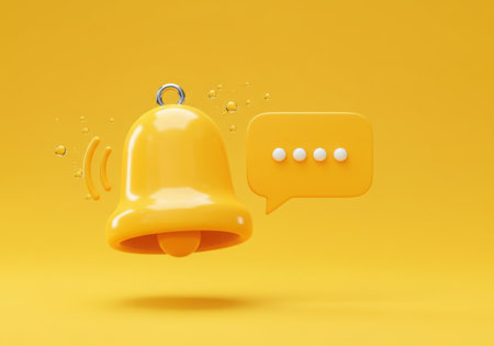 A bright yellow 3D rendered notification bell with subtle motion lines and a speech bubble icon indicating a message.の素材