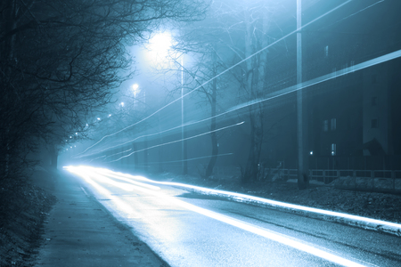 Industrial landscape of foggy streetの写真素材