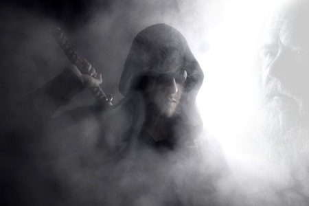 Warrior in black glasses in abstract smoke on black background