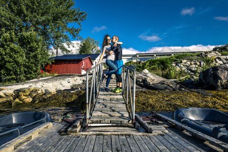 Happy and sporty couple enjoying the sunny day in Norwayの写真素材