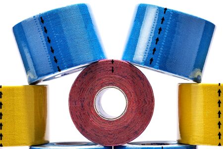 Colorful geometrical figures from reels of medical tape.の写真素材