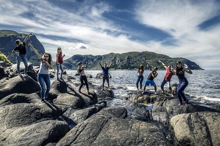 Group of young people is travelling around the Norway