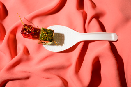 nice white spoon and colorful backgroundの写真素材