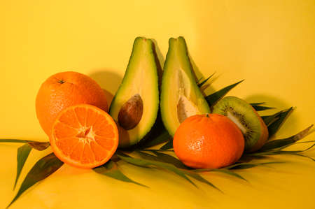 beautiful cut colored fruits close upの写真素材