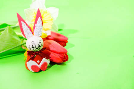 easter holiday beautiful eggs and rabbit colorful backgroundの写真素材