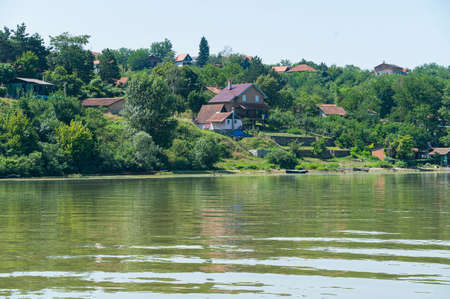 nice buildings by the water close up in the sunshineの写真素材