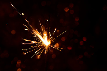 sparkler very nice colorful glittering decoration close upの写真素材