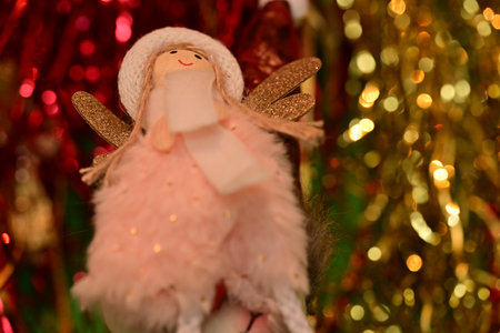 Christmas decoration with Santa Claus doll and christmas lights on background.の写真素材