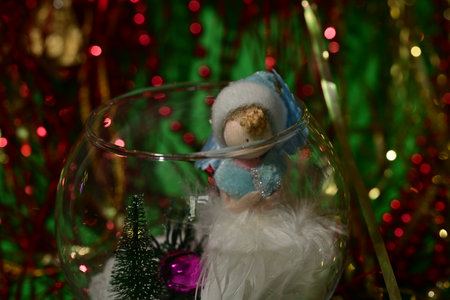 christmas decoration in the form of a santa claus in a glass bowlの写真素材