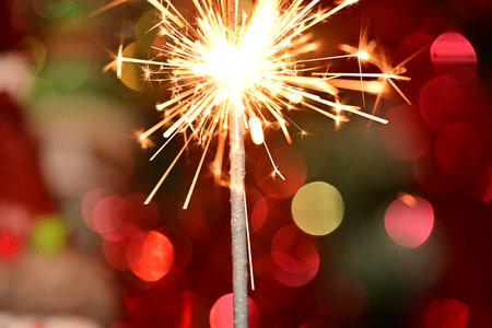 sparkler on bokeh background, christmas and new year conceptの写真素材
