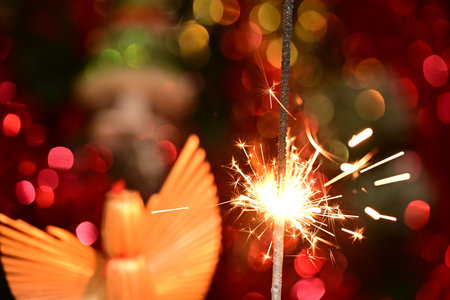 Christmas and New Year sparkler on bokeh background. Celebration conceptの写真素材