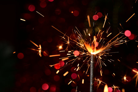 sparkler on bokeh background, new year and christmasの写真素材