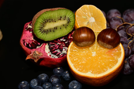Fruits on a black background, close-up, selective focusの写真素材