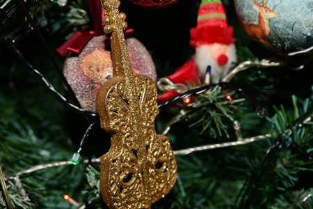 Christmas toys on the branches of a Christmas tree, close-upの写真素材
